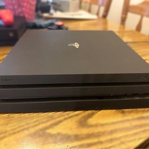 PlayStation 4 Pro, very lightly used, comes with unopened Red Dead Redemption 2
